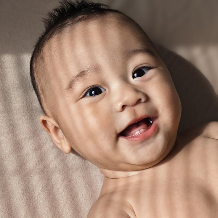 Avery Chen, Lead Design Curator at Island Cabin Pebble, reviewing corporate floral arrangements